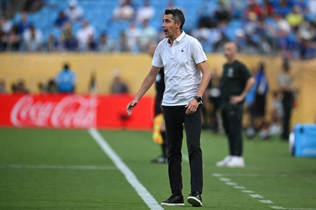 Benfica's Portuguese head coach Bruno Lage gestures during the FIFA Club World Cup 2025 round of 16 football match between Portugal's Benfica and England's Chelsea at the Bank of America Stadium in Charlotte on June 28, 2025. (Photo by Paul ELLIS / AFP)