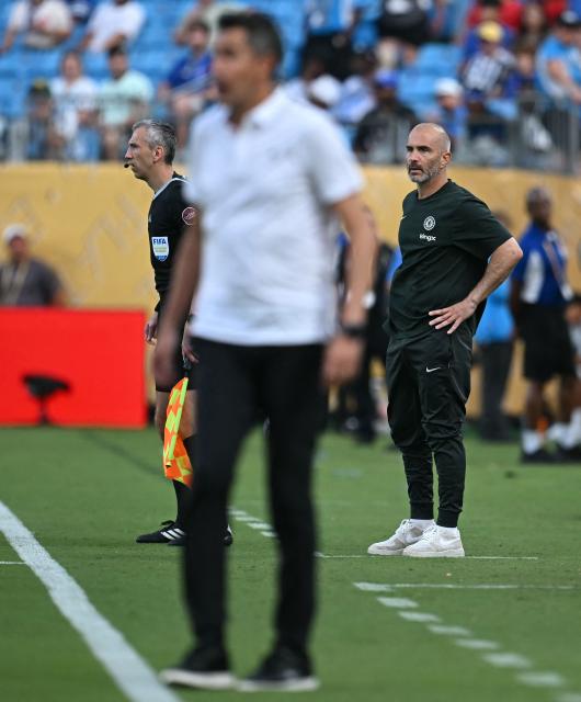 Chelsea's Italian head coach Enzo Maresca looks on during the FIFA Club World Cup 2025 round of 16 football match between Portugal's Benfica and England's Chelsea at the Bank of America Stadium in Charlotte on June 28, 2025. (Photo by Paul ELLIS / AFP)