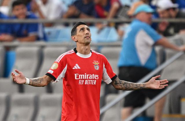 Benfica's Argentine midfielder #11 Angel Di Maria celebrates after shooting from the penalty spot to score his team's first goal during the FIFA Club World Cup 2025 round of 16 football match between Portugal's Benfica and England's Chelsea at the Bank of America Stadium in Charlotte on June 28, 2025. (Photo by Federico PARRA / AFP)