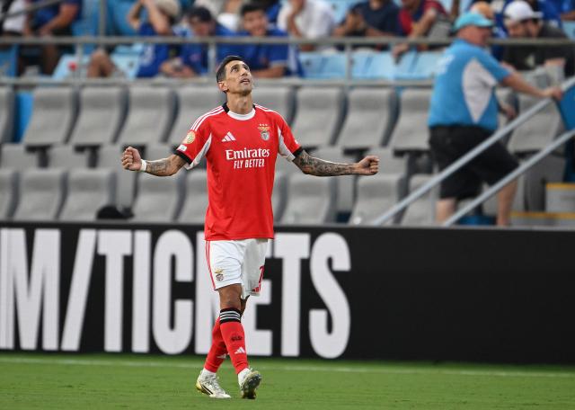 Benfica's Argentine midfielder #11 Angel Di Maria celebrates after shooting from the penalty spot to score his team's first goal during the FIFA Club World Cup 2025 round of 16 football match between Portugal's Benfica and England's Chelsea at the Bank of America Stadium in Charlotte on June 28, 2025. (Photo by Federico PARRA / AFP)
