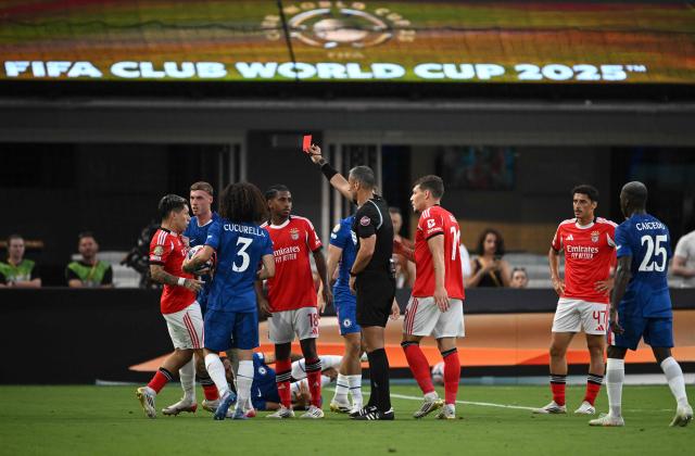 Slovenian referee Slavko Vincic shows a red card to Benfica's Argentine forward #25 Gianluca Prestianni during the FIFA Club World Cup 2025 round of 16 football match between Portugal's Benfica and England's Chelsea at the Bank of America Stadium in Charlotte on June 28, 2025. (Photo by Federico PARRA / AFP)