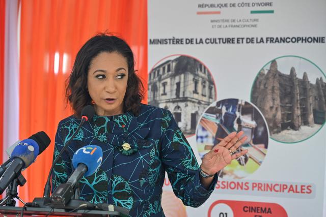 Ivorian Minister of Culture and Francophonie, Françoise Remarck speaks during the inauguration of an extension of Ivory Coast's first archaeological museum in the village of Singrobo-Ahouty near Tiassale on June 30, 2025. Ivory Coast on June 30, 2025 inaugurated a new extension of its first archaeological museum after Stone Age relics surfaced when a dam was being built in the south of the country. (Photo by Issouf SANOGO / AFP)