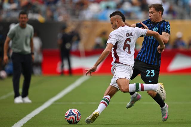 Fluminense's Brazilian defender #06 Rene and Inter Milan's Italian midfielder #23 Nicolo Barella fight for the ball during the FIFA Club World Cup 2025 round of 16 football match between Italy's Inter Milan and Brazil's Fluminense at the Bank of America Stadium in Charlotte on June 30, 2025. (Photo by ANGELA WEISS / AFP)
