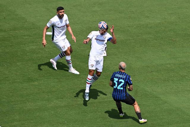 Fluminense's Brazilian defender #03 Thiago Silva heads the ball in front of Inter Milan's Italian defender #32 Federico Dimarco during the FIFA Club World Cup 2025 round of 16 football match between Italy's Inter Milan and Brazil's Fluminense at the Bank of America Stadium in Charlotte on June 30, 2025. (Photo by Federico PARRA / AFP)