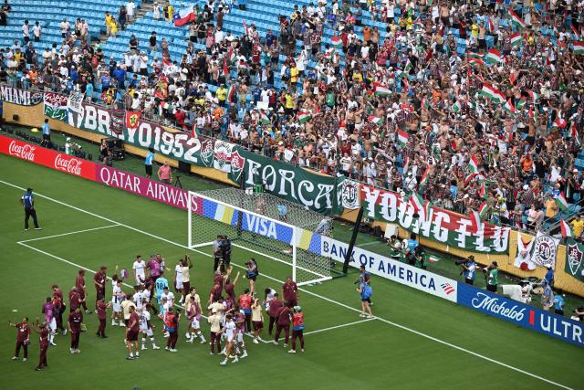 Fluminense players and staff celebrate after winning the FIFA Club World Cup 2025 round of 16 football match between Italy's Inter Milan and Brazil's Fluminense at the Bank of America Stadium in Charlotte on June 30, 2025. (Photo by Federico PARRA / AFP)