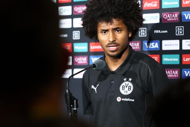 Borussia Dortmund's German forward #27 Karim Adeyemi speaks during a press conference at the Mercedes-Benz Stadium in Atlanta on June 30, 2025, ahead of the FIFA Club World Cup 2025 last 16 football match between Germany's Borussia Dortmund and Mexico's Monterrey. (Photo by FRANCK FIFE / AFP)