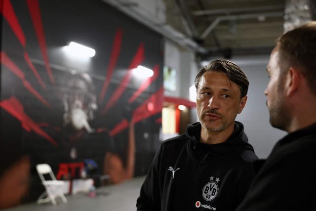 Borussia Dortmund's Croatian head coach Niko Kovac (L) attends a press conference at the Mercedes-Benz Stadium in Atlanta on June 30, 2025, ahead of the FIFA Club World Cup 2025 last 16 football match between Germany's Borussia Dortmund and Mexico's Monterrey. (Photo by FRANCK FIFE / AFP)
