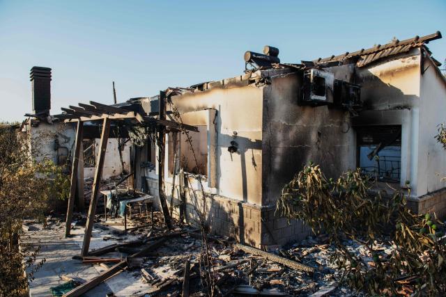 A burned house stands among debris following a wildfire in the Seferihisar district of Izmir, Turkey, on June 30, 2025. Rescuers have evacuated more than 50,000 people, mostly from Turkey's western Izmir province, as firefighters battled a string of wildfires, the AFAD disaster agency said Monday. (Photo by Ahmet Ayberk Cimen / AFP)