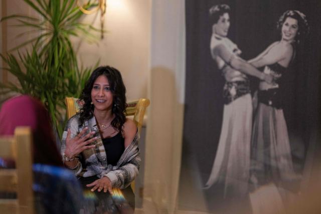 Egyptian belly-dancer Menna Emam, 30, full-time instructor at the Taksim Belly-dance Institute, gives an interview with AFP in Cairo on April 12, 2025. As belly dancing gains popularity internationally, young Egyptian performers are working to restore its reputation at home, pushing back against decades of stigma to reclaim the dance as part of their artistic heritage. Once iconic figures of Egypt's cinematic golden age, belly dancers have watched their prestige wane, their art increasingly confined to nightclubs and wedding halls. (Photo by Khaled DESOUKI / AFP)