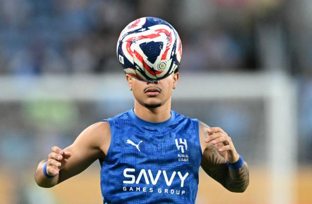 Al Hila's Brazilian midfielder #27 Kaio Cesar warms up ahead of the FIFA Club World Cup 2025 round of 16 football match between England's Manchester City and Saudi's Al-Hilal at the Camping World stadium in Orlando on June 30, 2025. (Photo by CHANDAN KHANNA / AFP)