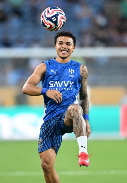 Al Hila's Brazilian midfielder #27 Kaio Cesar warms up ahead of the FIFA Club World Cup 2025 round of 16 football match between England's Manchester City and Saudi's Al-Hilal at the Camping World stadium in Orlando on June 30, 2025. (Photo by CHANDAN KHANNA / AFP)