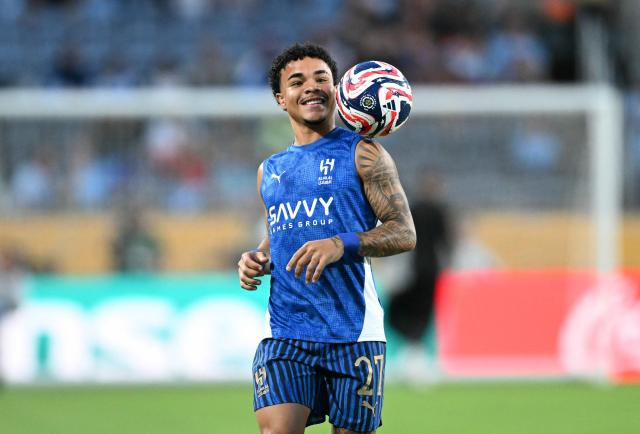 Al Hila's Brazilian midfielder #27 Kaio Cesar warms up ahead of the FIFA Club World Cup 2025 round of 16 football match between England's Manchester City and Saudi's Al-Hilal at the Camping World stadium in Orlando on June 30, 2025. (Photo by CHANDAN KHANNA / AFP)
