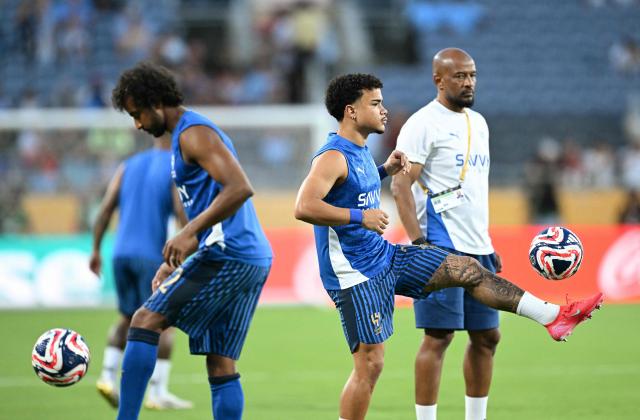 Al Hila's Brazilian midfielder #27 Kaio Cesar warms up ahead of the FIFA Club World Cup 2025 round of 16 football match between England's Manchester City and Saudi's Al-Hilal at the Camping World stadium in Orlando on June 30, 2025. (Photo by CHANDAN KHANNA / AFP)