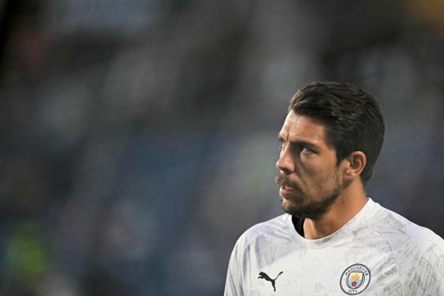 Manchester City's German goalkeeper #18 Stefan Ortega looks on during the warmup ahead of the FIFA Club World Cup 2025 round of 16 football match between England's Manchester City and Saudi's Al-Hilal at the Camping World stadium in Orlando on June 30, 2025. (Photo by PATRICIA DE MELO MOREIRA / AFP)
