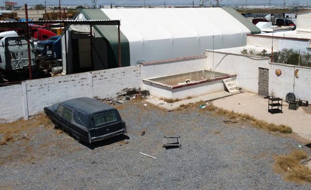 Aerial view of the crematorium where authorities found 381 embalmed corpses in Ciudad Juarez, Chihuahua State, Mexico, on June 30, 2025. Police have found 381 corpses piled up in a private crematorium in northern Mexico's Ciudad Juarez, the local prosecutor's office said on June 29, attributing the grisly find to negligence. (Photo by Herika Martinez / AFP)