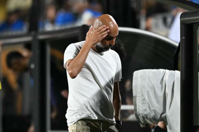 Manchester City's Spanish head coach Pep Guardiola gestures during the FIFA Club World Cup 2025 round of 16 football match between England's Manchester City and Saudi's Al-Hilal at the Camping World stadium in Orlando on June 30, 2025. (Photo by PATRICIA DE MELO MOREIRA / AFP)