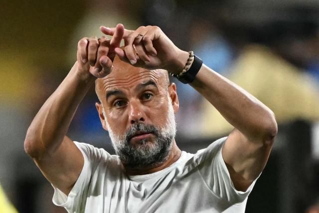 Manchester City's Spanish head coach Pep Guardiola gestures during the FIFA Club World Cup 2025 round of 16 football match between England's Manchester City and Saudi's Al-Hilal at the Camping World stadium in Orlando on June 30, 2025. (Photo by PATRICIA DE MELO MOREIRA / AFP)