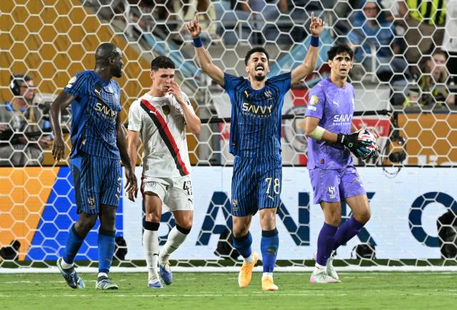 Al Hilal's Saudi defender #78 Ali Lajami celebrates after winning the FIFA Club World Cup 2025 round of 16 football match between England's Manchester City and Saudi's Al-Hilal at the Camping World stadium in Orlando on June 30, 2025. (Photo by CHANDAN KHANNA / AFP)