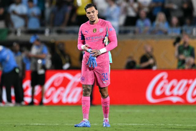 Manchester City's Brazilian goalkeeper #31 Ederson reacts after losing the FIFA Club World Cup 2025 round of 16 football match between England's Manchester City and Saudi's Al-Hilal at the Camping World stadium in Orlando on June 30, 2025. (Photo by PATRICIA DE MELO MOREIRA / AFP)