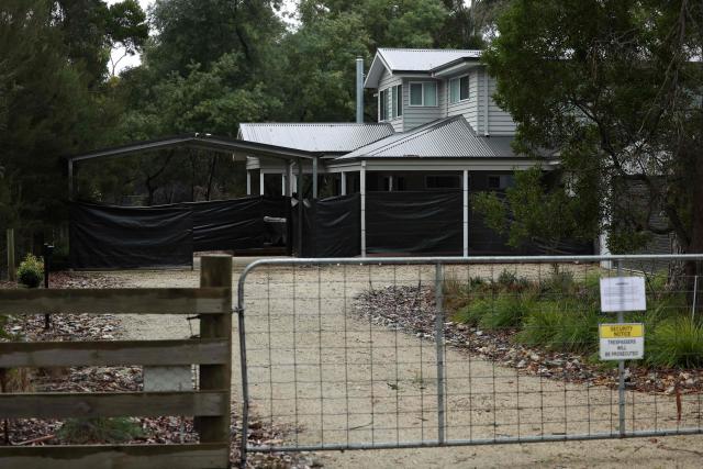A notice on the gate of the home of Erin Patterson, an Australian woman who was on trial after being accused of murdering three members of her husband's family with a toxic mushroom-laced beef Wellington lunch, is seen in Leongatha on July 1, 2025. Jury members retired on June 30 to decide the fate of an Australian woman accused of murdering three members of her husband's family with a toxic mushroom-laced beef Wellington lunch. Jurors began deliberating their verdict on 50-year-old home cook Erin Patterson after a nine-week trial. (Photo by Martin KEEP / AFP)