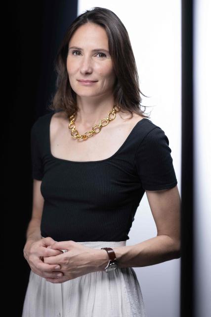 French writer and journalist Elsa Fottorino poses during a photo session in Paris on July 1, 2025. (Photo by JOEL SAGET / AFP)