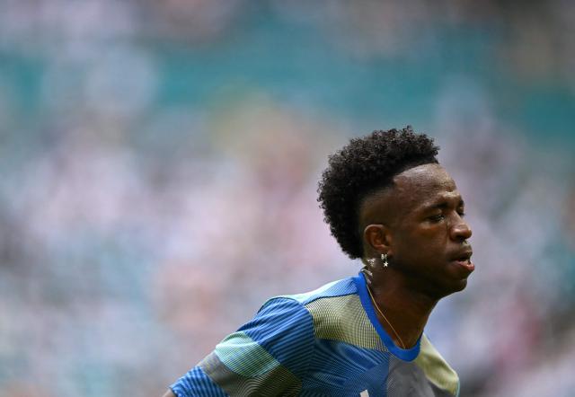 Real Madrid's Brazilian forward #07 Vinicius Junior warms up ahead of the FIFA Club World Cup 2025 round of 16 football match between Spain's Reald Madrid and Italy's Juventus at the Hard Rock Stadium in Miami on July 1, 2025. (Photo by PATRICIA DE MELO MOREIRA / AFP)
