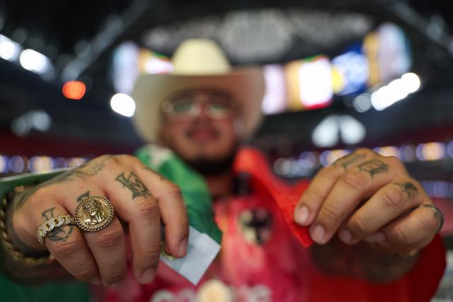 A fan of Monterrey cheer for their team before the FIFA Club World Cup 2025 round of 16 football match between Germany's Borussia Dortmund and Mexico's Monterrey at the Mercedes-Benz Stadium in Atlanta on July 1, 2025. (Photo by FRANCK FIFE / AFP)