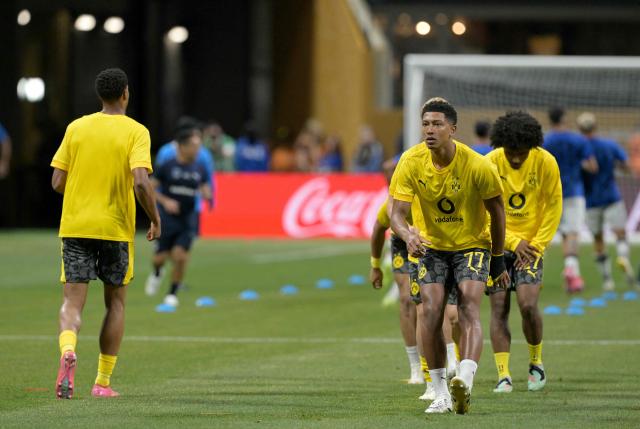 Borussia Dortmund's English midfielder #77 Jobe Bellingham warms up next to teammates ahead of the FIFA Club World Cup 2025 round of 16 football match between Germany's Borussia Dortmund and Mexico's Monterrey at the Mercedes-Benz Stadium in Atlanta on July 1, 2025. (Photo by Juan MABROMATA / AFP)