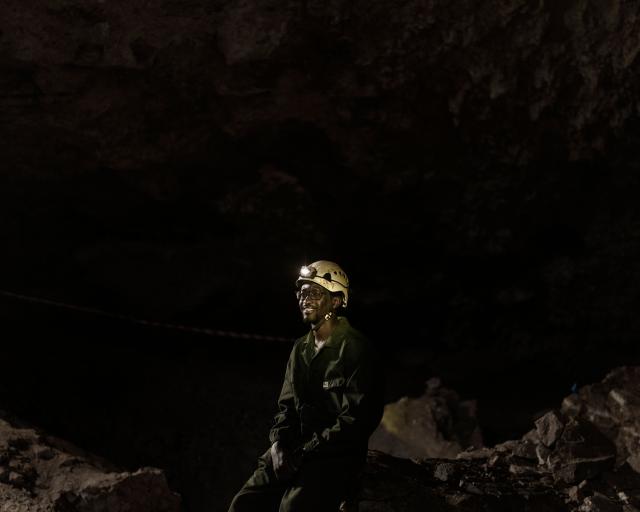 Tebogo Makhubela, a South African geologist recipient of one of the prestigious National Geographic 2025 Wayfinder Awards, poses for a portrait inside the The Rising Star cave, in The Cradle of Humankind area, on June 26, 2025. Makhubela now leads a research team working to uncover ancient clues of human evolution.
His turf lies below the surface of the Earth, in the limestone caves of South Africa's Cradle of Humankind, a UNESCO World Heritage Site about 50 kilometres (30 miles) northwest of Johannesburg. (Photo by MARCO LONGARI / AFP)
