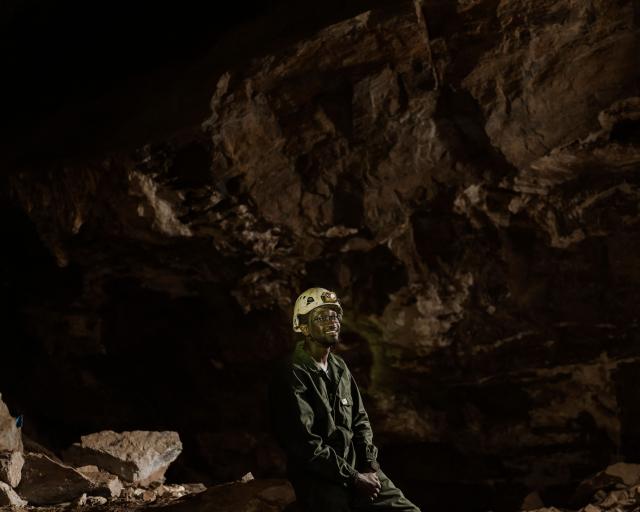 Tebogo Makhubela, a South African geologist recipient of one of the prestigious National Geographic 2025 Wayfinder Awards, poses for a portrait inside the The Rising Star cave, in The Cradle of Humankind area, on June 26, 2025. Makhubela now leads a research team working to uncover ancient clues of human evolution.
His turf lies below the surface of the Earth, in the limestone caves of South Africa's Cradle of Humankind, a UNESCO World Heritage Site about 50 kilometres (30 miles) northwest of Johannesburg. (Photo by MARCO LONGARI / AFP)