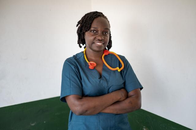 Mary Nakaliika, 24, an adopted daughter of Dr. Anne Merriman and nurse who treated her in her last days poses for a photo in Kampala, on June 26, 2025. Hospice Africa Uganda (HAU), founded in 1993 by Dr Anne Merriman, brought holistic end-of-life care to Uganda at a time when it was offered in only three African countries.
By the time Merriman died in May 2025, aged 90, she had treated more than 40,000 patients in Uganda and her model had spread to 37 African countries. (Photo by Badru Katumba / AFP)