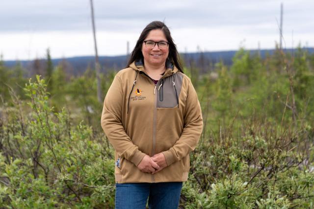 Angel Mianscum, Deputy Chief of the Ouje-Bougoumou Cree Nation, stands for a portrait in Chibougamau, Quebec, Canada, a location where the company Flash Forest uses drones to plant tree seeds, on June 19, 2025. Forests in Northern Quebec province were ravaged by wildfires in the summer of 2023 and for the second year in a row a pilot project has been using drones to plant new black spruces and jack pines. Rather than simply dropping seeds from high above, the company Flash Forest, which is leading the initiative, uses seeds protected in capsules that also contain water and nutrients, as well as fungi, to maximize their growing potential. "It's sad to have lost so much forest," laments Angel Mianscum, one of the Indigenous leaders of a nearby Cree community.
She is, however, pleased to see that there are now "innovative ways of doing things." The Cree community has worked directly with Flash Forest to plan the local reforestation. Indigenous communities are the most affected by fires in Canada because they are often remote and deep in the boreal forest. (Photo by François Robert-Durand / AFP)