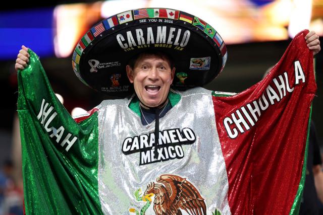 A fan of Monterrey poses for a picture ahead of the FIFA Club World Cup 2025 round of 16 football match between Germany's Borussia Dortmund and Mexico's Monterrey at the Mercedes-Benz Stadium in Atlanta on July 1, 2025. (Photo by CHARLY TRIBALLEAU / AFP)