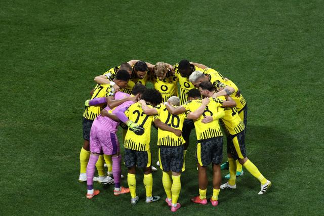 Borussia Dortmund's players gather ahead of the FIFA Club World Cup 2025 round of 16 football match between Germany's Borussia Dortmund and Mexico's Monterrey at the Mercedes-Benz Stadium in Atlanta on July 1, 2025. (Photo by Franck FIFE / AFP)