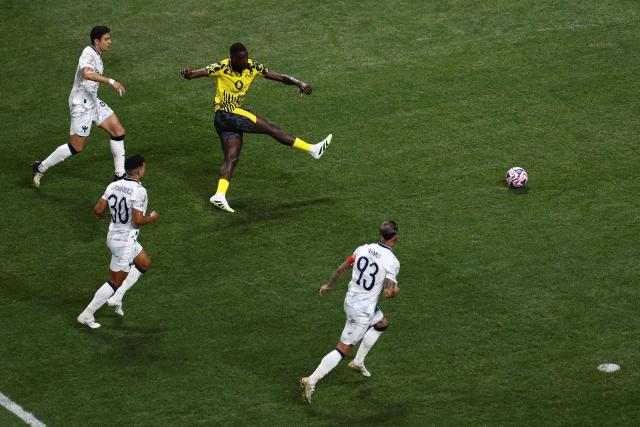 Borussia Dortmund's Guinean forward #09 Serhou Guirassy scores his team's first goal during the FIFA Club World Cup 2025 round of 16 football match between Germany's Borussia Dortmund and Mexico's Monterrey at the Mercedes-Benz Stadium in Atlanta on July 1, 2025. (Photo by Franck FIFE / AFP)
