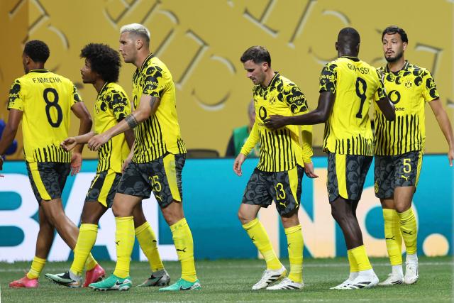 Borussia Dortmund's Guinean forward #09 Serhou Guirassy (2nd-R) celebrates with teammates after scoring his team's first goal during the FIFA Club World Cup 2025 round of 16 football match between Germany's Borussia Dortmund and Mexico's Monterrey at the Mercedes-Benz Stadium in Atlanta on July 1, 2025. (Photo by Charly TRIBALLEAU / AFP)