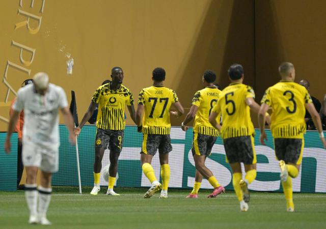 Borussia Dortmund's Guinean forward #09 Serhou Guirassy (L) celebrates after scoring his team's first goal during the FIFA Club World Cup 2025 round of 16 football match between Germany's Borussia Dortmund and Mexico's Monterrey at the Mercedes-Benz Stadium in Atlanta on July 1, 2025. (Photo by JUAN MABROMATA / AFP)