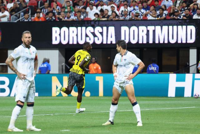 Borussia Dortmund's Guinean forward #09 Serhou Guirassy celebrates scoring his team's second goal during the FIFA Club World Cup 2025 round of 16 football match between Germany's Borussia Dortmund and Mexico's Monterrey at the Mercedes-Benz Stadium in Atlanta on July 1, 2025. (Photo by Charly TRIBALLEAU / AFP)