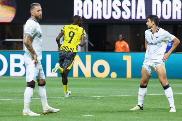 Borussia Dortmund's Guinean forward #09 Serhou Guirassy celebrates scoring his team's second goal during the FIFA Club World Cup 2025 round of 16 football match between Germany's Borussia Dortmund and Mexico's Monterrey at the Mercedes-Benz Stadium in Atlanta on July 1, 2025. (Photo by Charly TRIBALLEAU / AFP)
