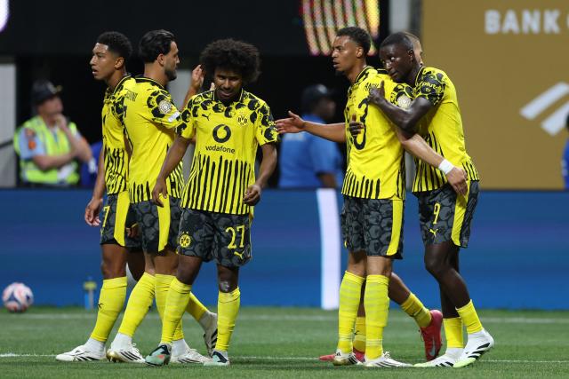 Borussia Dortmund's Guinean forward #09 Serhou Guirassy (R) celebrates scoring his team's second goal with teammates during the FIFA Club World Cup 2025 round of 16 football match between Germany's Borussia Dortmund and Mexico's Monterrey at the Mercedes-Benz Stadium in Atlanta on July 1, 2025. (Photo by CHARLY TRIBALLEAU / AFP)