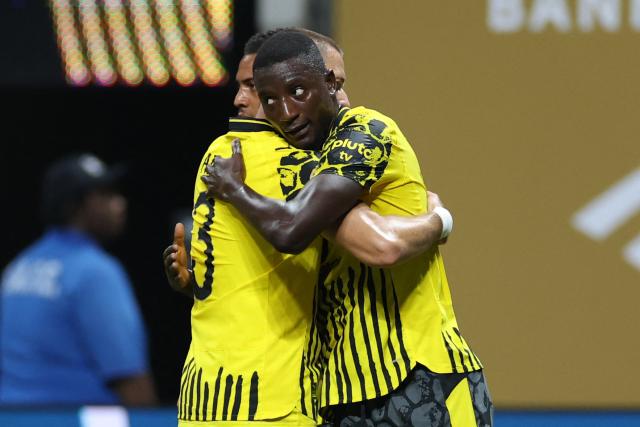 Borussia Dortmund's Guinean forward #09 Serhou Guirassy (R) celebrates scoring his team's second goal during the FIFA Club World Cup 2025 round of 16 football match between Germany's Borussia Dortmund and Mexico's Monterrey at the Mercedes-Benz Stadium in Atlanta on July 1, 2025. (Photo by Charly TRIBALLEAU / AFP)