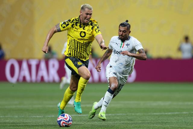 Borussia Dortmund's German defender #25 Niklas Suele and Monterrey's Mexican forward #17 Jesus Corona fight for the ball during the FIFA Club World Cup 2025 round of 16 football match between Germany's Borussia Dortmund and Mexico's Monterrey at the Mercedes-Benz Stadium in Atlanta on July 1, 2025. (Photo by Charly TRIBALLEAU / AFP)