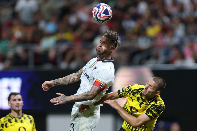 Monterrey's Spanish defender #93 Sergio Ramos and Borussia Dortmund's German defender #03 Waldemar Anton fight for the ball during the FIFA Club World Cup 2025 round of 16 football match between Germany's Borussia Dortmund and Mexico's Monterrey at the Mercedes-Benz Stadium in Atlanta on July 1, 2025. (Photo by CHARLY TRIBALLEAU / AFP)