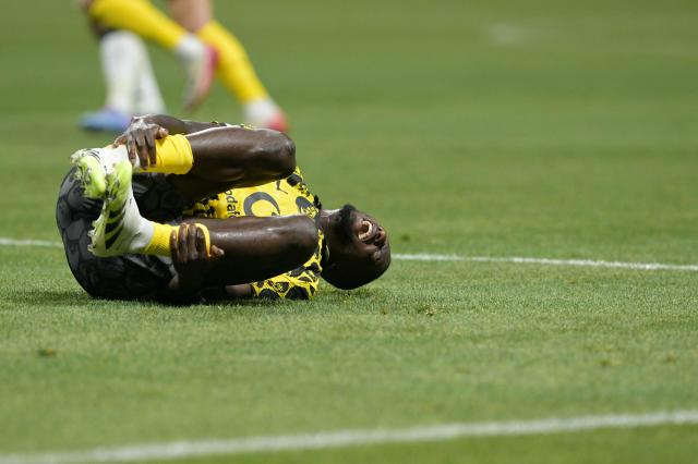 Borussia Dortmund's Guinean forward #09 Serhou Guirassy reacts on the ground during the FIFA Club World Cup 2025 round of 16 football match between Germany's Borussia Dortmund and Mexico's Monterrey at the Mercedes-Benz Stadium in Atlanta on July 1, 2025. (Photo by JUAN MABROMATA / AFP)