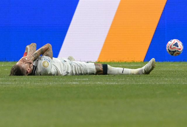 Monterrey's Spanish defender #93 Sergio Ramos reacts on the ground during the FIFA Club World Cup 2025 round of 16 football match between Germany's Borussia Dortmund and Mexico's Monterrey at the Mercedes-Benz Stadium in Atlanta on July 1, 2025. (Photo by Juan MABROMATA / AFP)