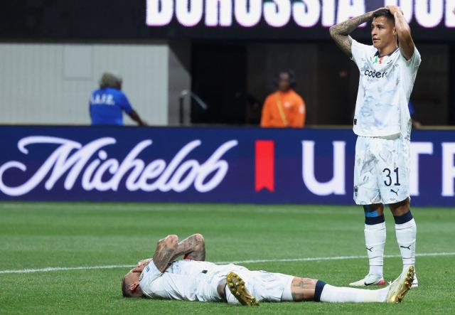 Monterrey's Spanish defender #93 Sergio Ramos (L) and Mexican forward #31 Roberto De La Rosa (R) react during the FIFA Club World Cup 2025 round of 16 football match between Germany's Borussia Dortmund and Mexico's Monterrey at the Mercedes-Benz Stadium in Atlanta on July 1, 2025. (Photo by Charly TRIBALLEAU / AFP)