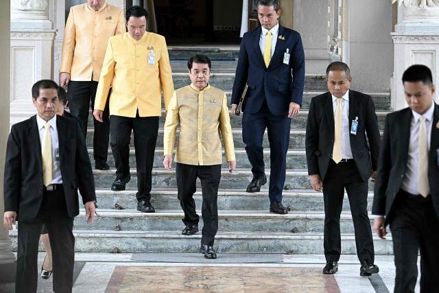 Thailand's acting Prime minister Suriya Jungrungreangkit (C) arrives at the Government House in Bangkok on July 2, 2025. (Photo by Lillian SUWANRUMPHA / AFP)