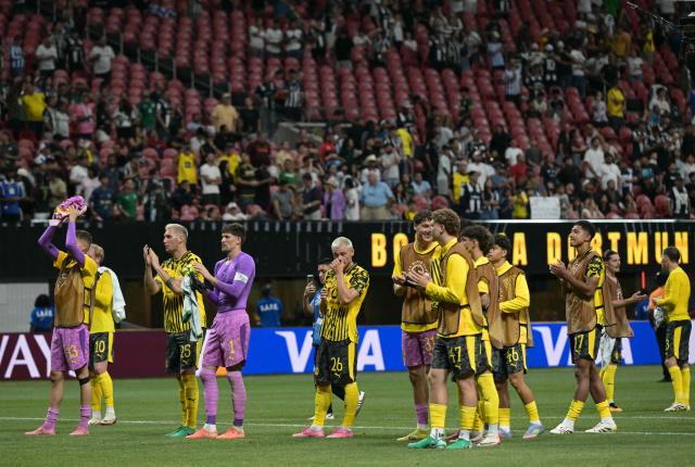 Borussia Dortmund players acknowledge the crowd after winning the FIFA Club World Cup 2025 round of 16 football match between Germany's Borussia Dortmund and Mexico's Monterrey at the Mercedes-Benz Stadium in Atlanta on July 1, 2025. (Photo by JUAN MABROMATA / AFP)