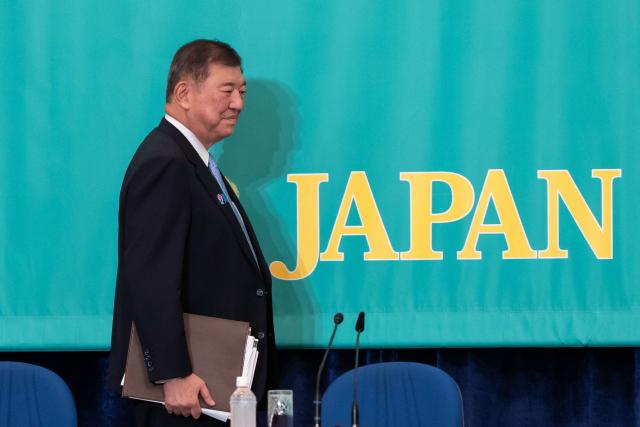 Japan's Prime Minister and Liberal Democratic Party President Shigeru Ishiba arrives for a debate with leaders of eight political parties at the Japan National Press Club in Tokyo on July 2, 2025. (Photo by Tomohiro Ohsumi / POOL / AFP)