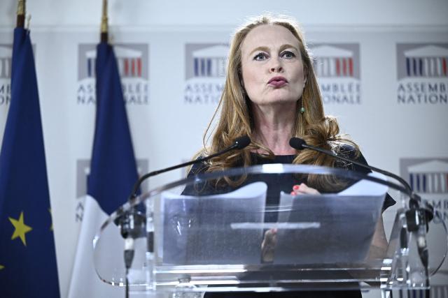 Commission's rapporteurViolette Spillebout gives a press conference to present the report of the parliamentary commission on violence in schools at the National Assembly in Paris, on  July 2, 2025. The commission of inquiry was born out of the scandal surrounding the revelations of decades of sexual and physical abuse at the Notre-Dame de Betharram school. (Photo by JULIEN DE ROSA / AFP)